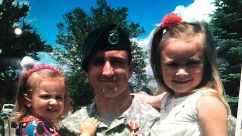 Sfc. Richard Styskal poses with his daughters